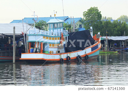 A large fishing boat in the water. A large fishing boat in the water. 67141300