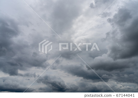 Heavy rain clouds and dark sky background material Heavy rain clouds and dark sky background material 67144041