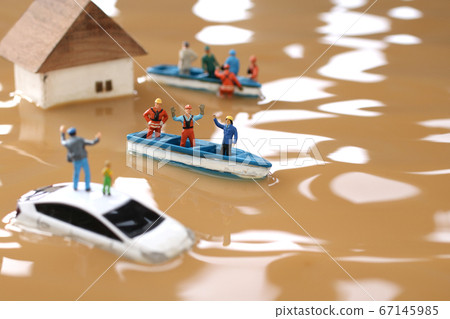 Diorama of flood damage, people seeking help and rescue teams 67145985