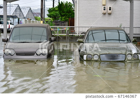 Two cars submerged in heavy rain in western Japan Two cars submerged in heavy rain in western Japan 67146367