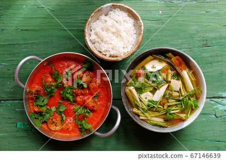 Vietnamese meal for lunch, vegetarian homemade food, tofu ball cook with tomato sauce, vegetable soup, rice bowl 67146639