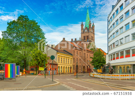View of a street in Oslo and Greenland Church (Gronland Kirke) on Pride parade days, Norway 67151938