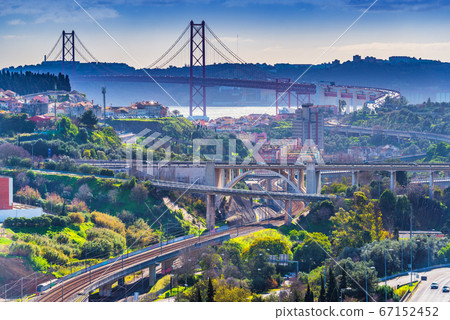 Picturesque panorama of Lisbon with 25th April Bridge and numerous highways, Portugal Picturesque panorama of Lisbon with 25th April Bridge and numerous highways, Portugal 67152452