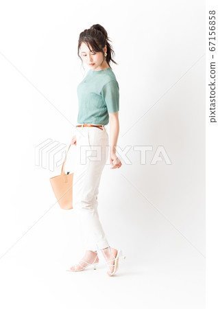 Office casual woman with shoulder bag 67156858
