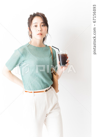 Office casual woman having ice coffee Office casual woman having ice coffee 67156893