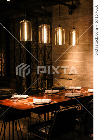 Seating inside the restaurant at night Seating inside the restaurant at night 67157016