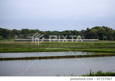 Narita Line 113 series going through the countryside 67157067