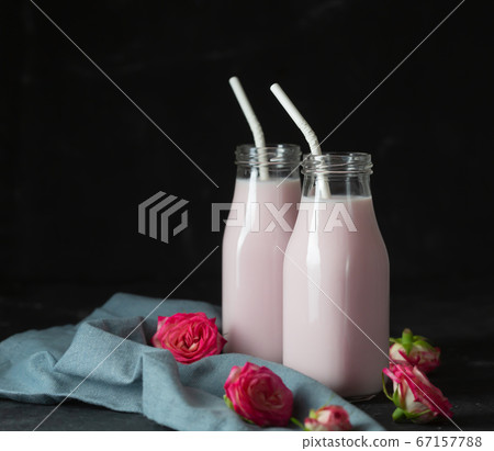 Moon milk prepares with pink rose flower in two Moon milk prepares with pink rose flower in two 67157788