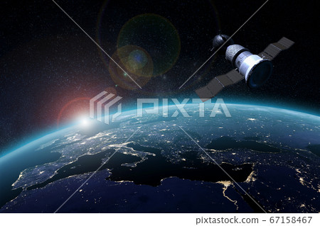 Spaceship and the Earth on the background. Elements of this image furnished by NASA 67158467