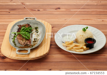 Tasty food on wooden table Tasty food on wooden table 67158553