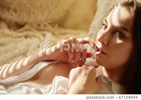 woman in sun light 67159044