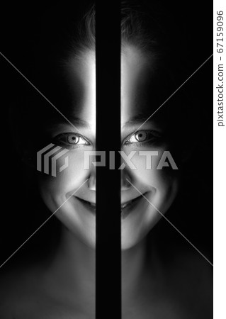 woman in dramatic light woman in dramatic light 67159096