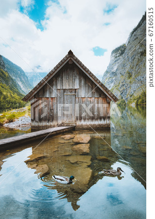 Old boat house at Lake Obersee in the Bavarian Alps, Germany Old boat house at Lake Obersee in the Bavarian Alps, Germany 67160515