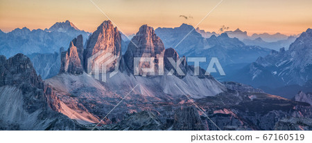 Tre Cime di Lavaredo mountain summits in the Dolomites at sunset, South Tyrol, Italy Tre Cime di Lavaredo mountain summits in the Dolomites at sunset, South Tyrol, Italy 67160519