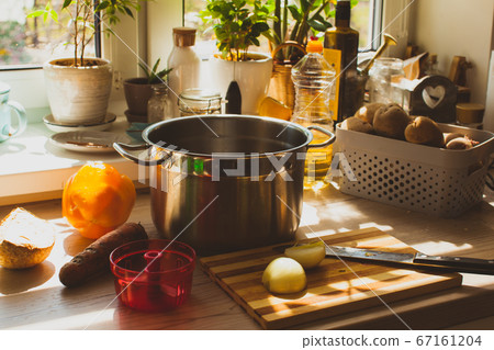 Still life kitchen with large pan and groceries Still life kitchen with large pan and groceries 67161204