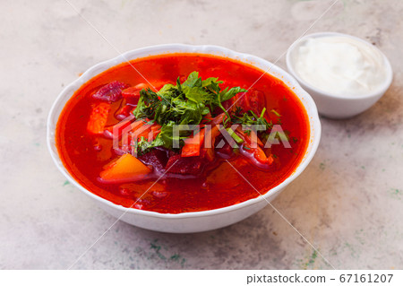 Delicious red borsch with herbs and sour cream 67161207