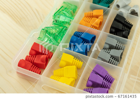 plastic box full of caps for rj 45 cable red, 67161435