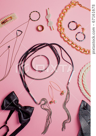 Jewelry. Women fashion concept. Trendy hair accessories and bijouterie on pink background. Jewelry. Women fashion concept. Trendy hair accessories and bijouterie on pink background. 67161678