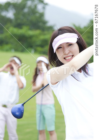 Women playing golf Women playing golf 67167678