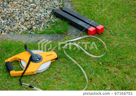 Image of land boundary pile surveying 67168781