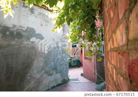 Thin and winding back alley of Lukang, Changhua County, Taiwan 67170515