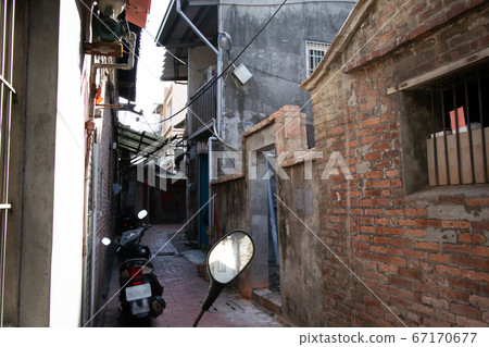 Thin and winding back alley of Lukang, Changhua County, Taiwan 67170677