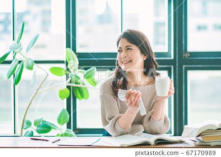 Woman studying in a cafe English conversation qualification test Woman studying in a cafe English conversation qualification test 67170989