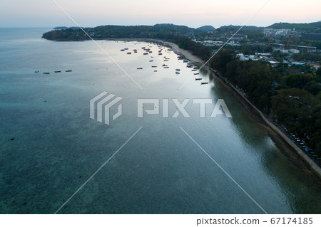 Aerial view drone shot of long tail boats at rawai Aerial view drone shot of long tail boats at rawai 67174185