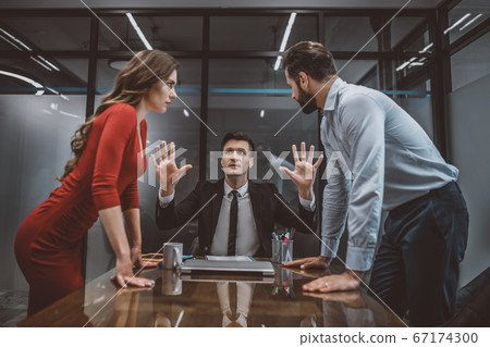 Lawyer trying to stop the argument between spouses Lawyer trying to stop the argument between spouses 67174300