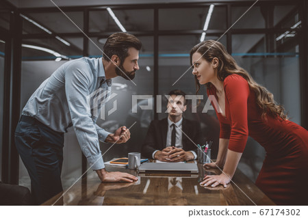 Couple having an argument in lawyers office 67174302