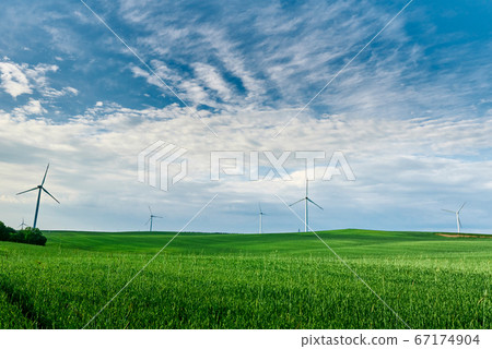 Wind turbine in the field. Wind power energy Wind turbine in the field. Wind power energy 67174904