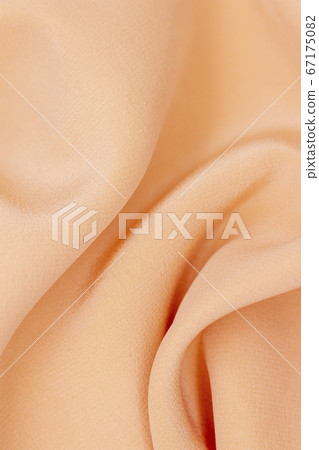 Fabric golden in natural silk. Peach smooth silk fabric. 67175082
