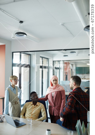 Multi-Ethnic Business Team Working in Conference Room Multi-Ethnic Business Team Working in Conference Room 67178339