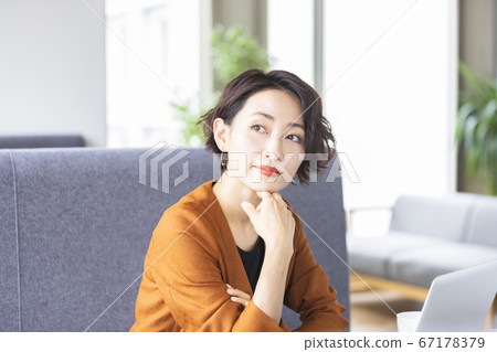 Business woman having a meeting Business woman having a meeting 67178379