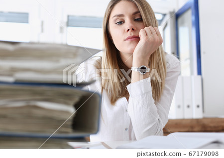 Lot of work wait for tired and exhausted woman Lot of work wait for tired and exhausted woman 67179098
