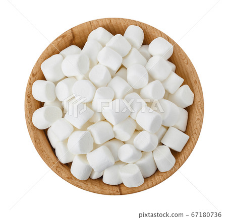 Marshmallow in wooden bowl isolated on white background with clipping path and full depth of field. Top view. Flat lay Marshmallow in wooden bowl isolated on white background with clipping path and full depth of field. Top view. Flat lay 67180736