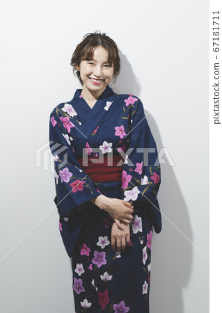 A woman in a yukata A woman in a yukata 67181711