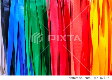 Colored lanyards for keys and passes. Selective focus. Colored lanyards for keys and passes. Selective focus. 67182106