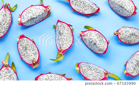 Ripe dragonfruit or pitahaya slices on blue 67183990