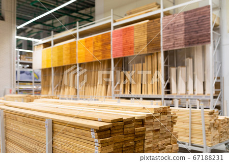 hardware store shelving with large wooden boards Stock Photo