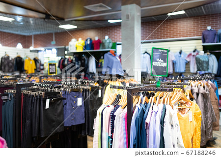 department store with a large assortment of clothes 67188246
