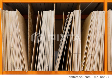 hardware store: shelving with large wooden boards hardware store: shelving with large wooden boards 67188327