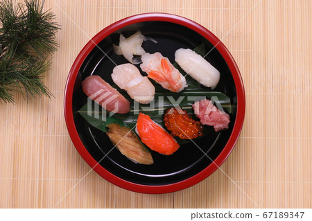 Nigiri sushi arranged in a sushi trough Nigiri sushi arranged in a sushi trough 67189347