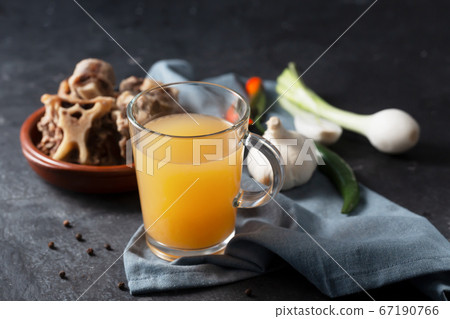 Homemade Beef Bone Broth in Glass Storage Jar on a 67190766