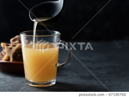 Homemade Beef Bone Broth in Glass Storage Jar on a 67190768