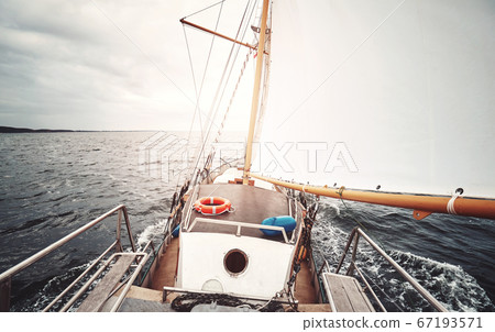 Sailing against the sun. Sailing against the sun. 67193571