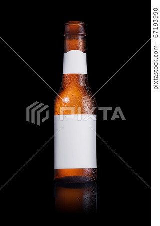 Beer bottle with a blank label on a black 67193990