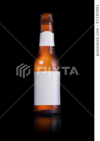 Beer bottle with a blank label on a black 67193991