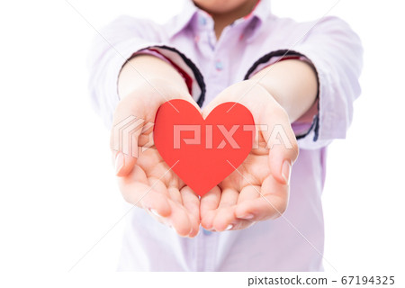 Hand holding a heart Hand holding a heart 67194325