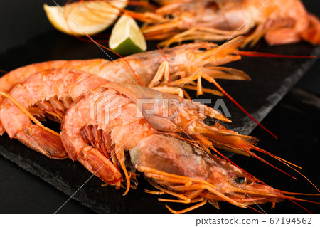 Raw shrimp langostino and lime Raw shrimp langostino and lime 67194562